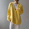 Women's long knit V-neck sweater with oversized buttons