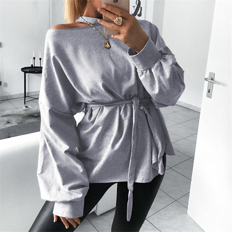 Modern long-sleeved blouse with slanted shoulder