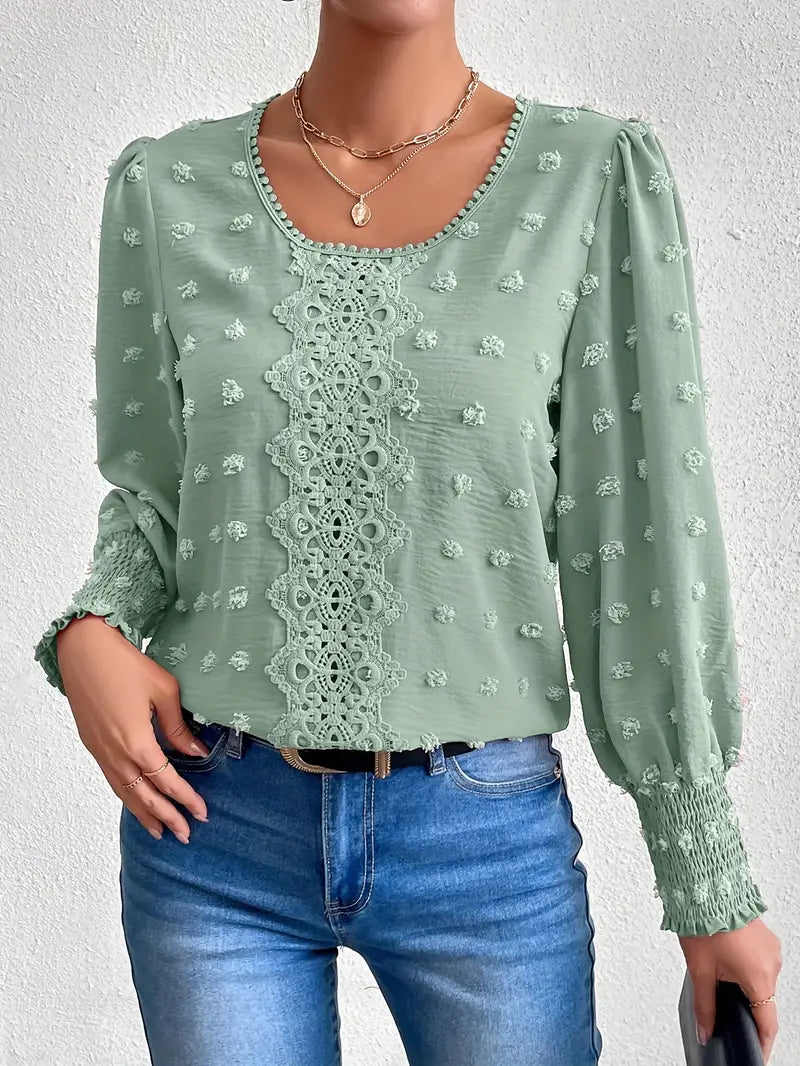 Elegant Blouse With Swiss Dots and a Round Neckline