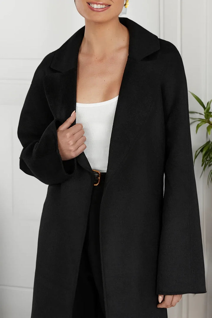 Stylish long women's trench coat in oversize style