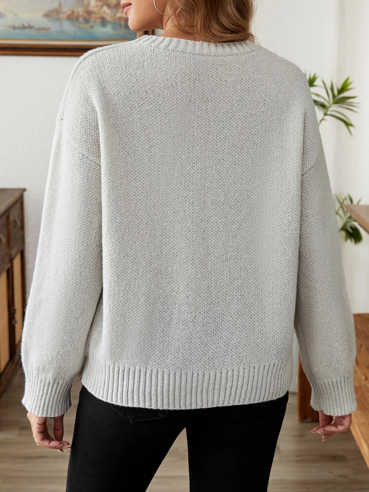 Soft knitted jumper with heart pattern