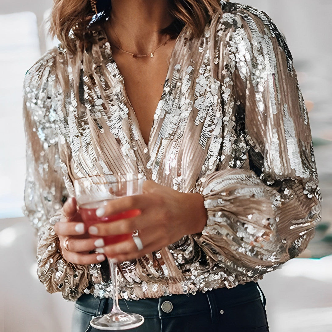 Elegant V-neck blouse with shimmering sequins