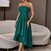 Green sleeveless elegant flared party dress with bare upper body