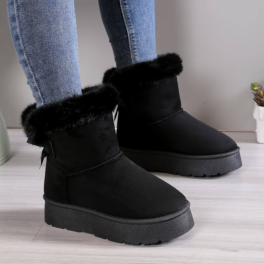 Stylish, thermo-lined plush boots with bow knot