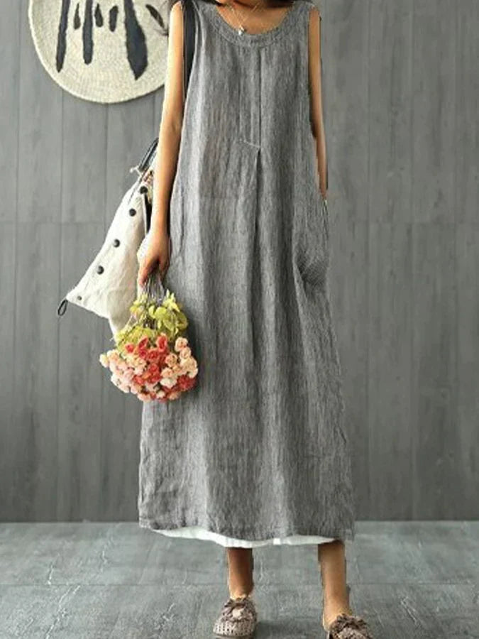 Loose, sleeveless cotton linen dress with a round neckline