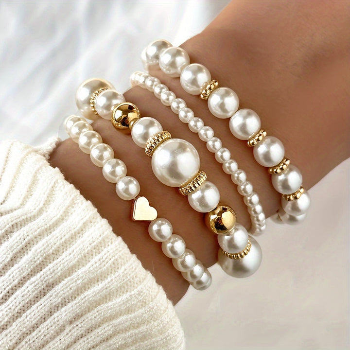 Set of 4 bracelets with artificial pearls