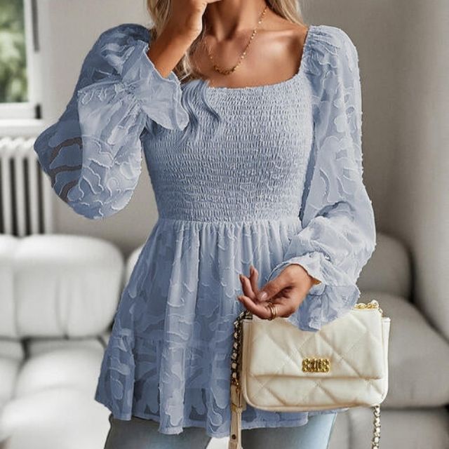 Ruffled blouse with a square neckline and sheer sleeves