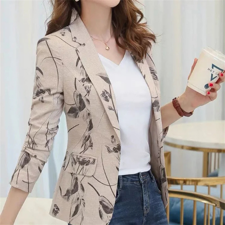 Women's blazer with floral pattern and ankle button fastening