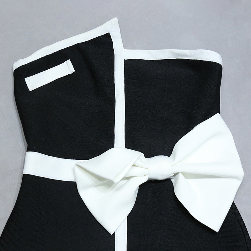 Modern black strapless mini dress with bow