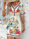 Elegant Dress With V-Neck, Short Sleeves and Floral Pattern With Tassels