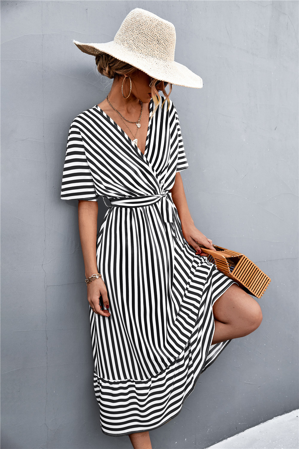 Striped long dress with wrap pattern