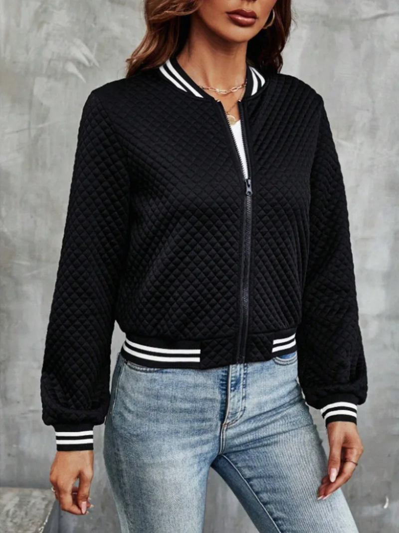 Casual bomber jacket with a light quilted pattern and striped details