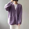 Oversized jumper with V-neck and button placket for women