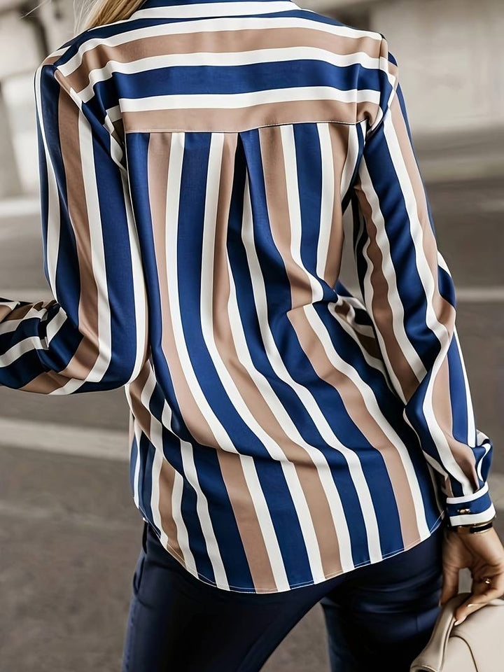 Knitted women's blouse with stripes