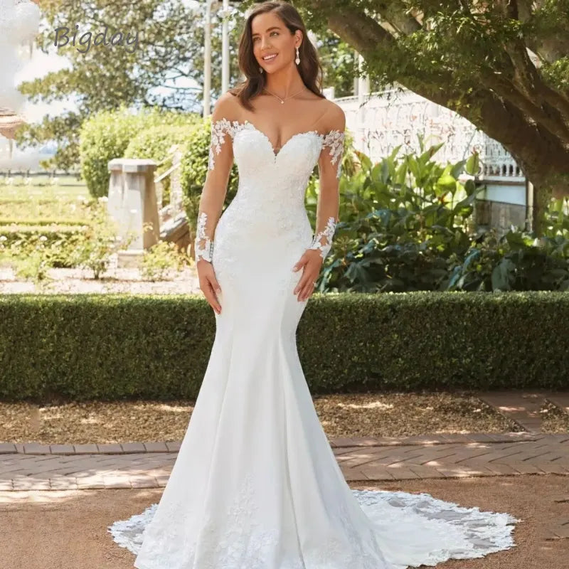 Elegant sweetheart mermaid wedding dress with long sleeves and lace