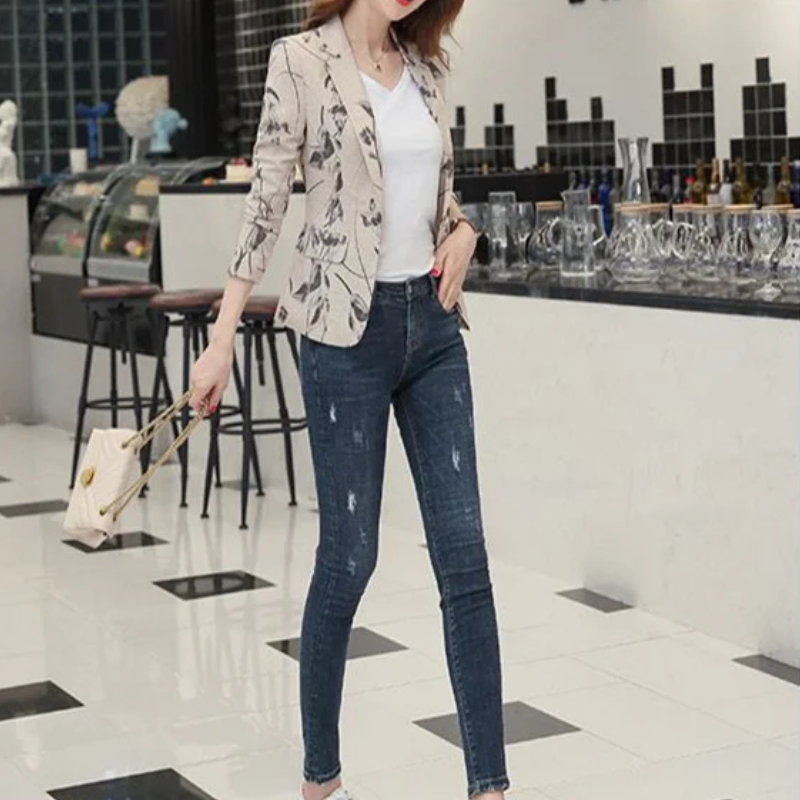 Women's blazer with floral pattern and ankle button fastening