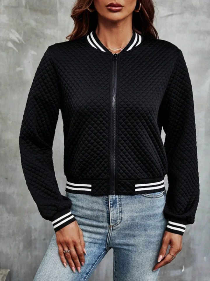 Casual bomber jacket with a light quilted pattern and striped details