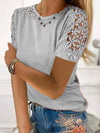 Simple T-shirt with a round neckline and lace seams