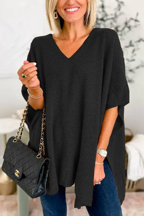 Jumper with irregular hem and V-neckline