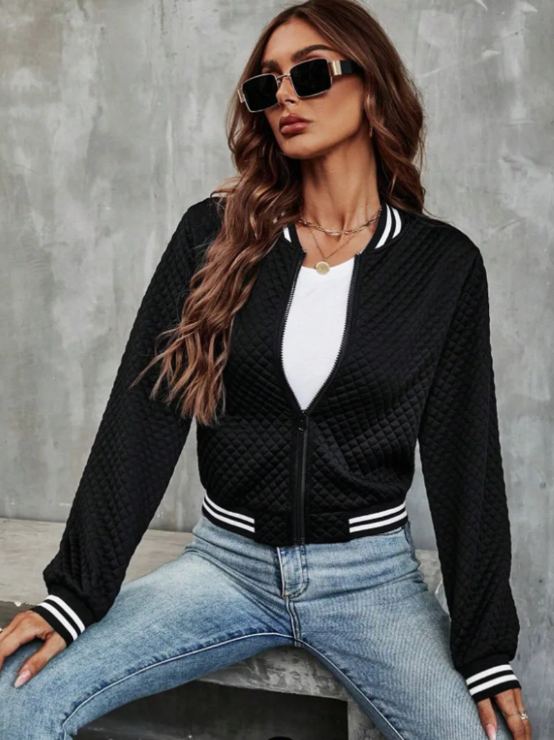 Casual bomber jacket with a light quilted pattern and striped details