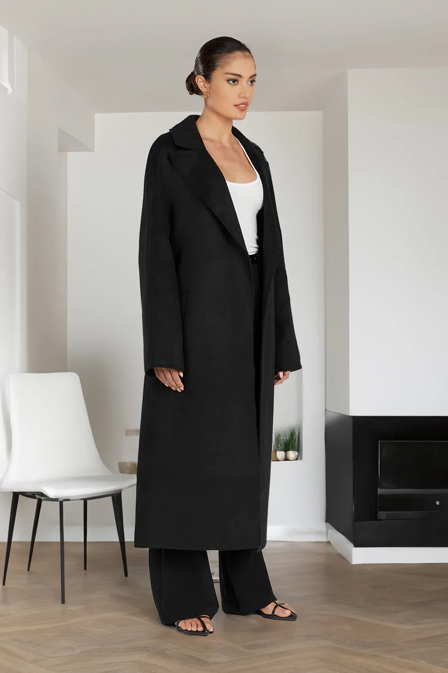 Stylish long women's trench coat in oversize style