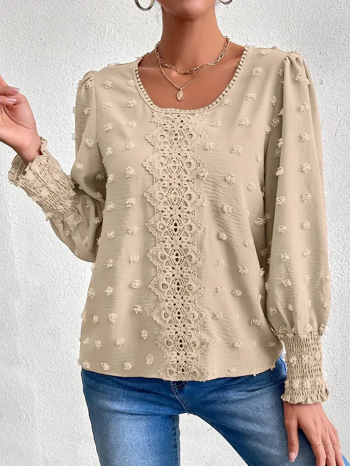 Elegant Blouse With Swiss Dots and a Round Neckline