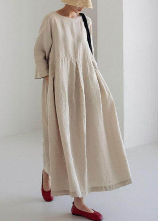 Fashionable apricot coloured wide dress