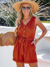 Belted romper with V-neckline