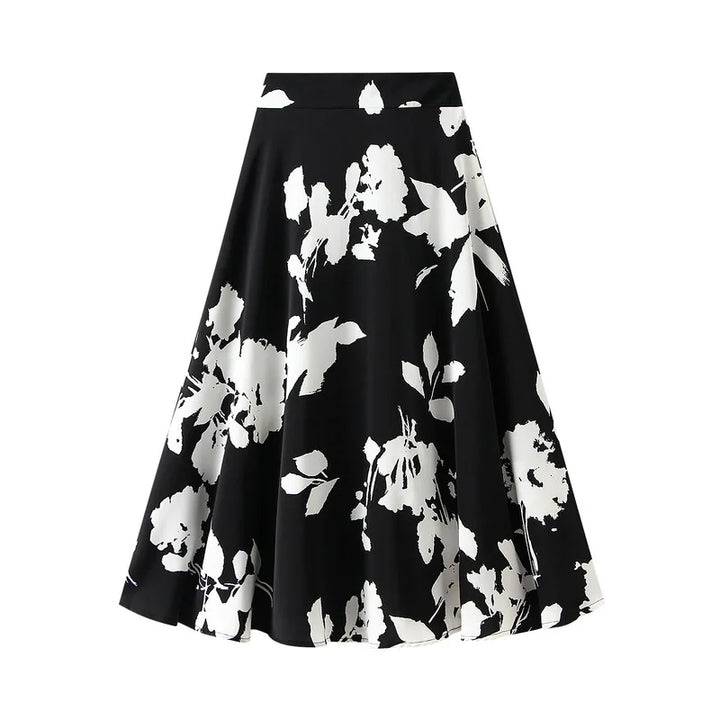 Long pleated skirt with tree branch print