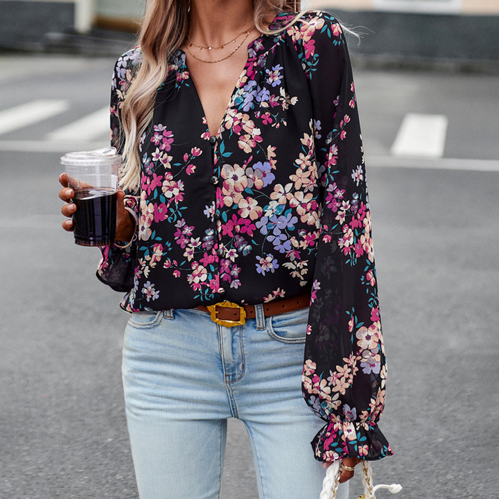 Floral blouse with V-neck and puff sleeves