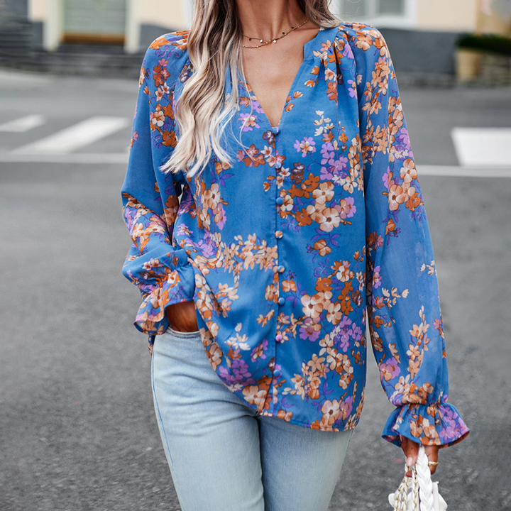 Floral blouse with V-neck and puff sleeves