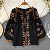 Bohemian blouse with tassels and embroidery