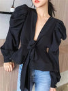 V-neck blouse with long puff sleeves