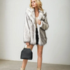 Elegant winter coat made from faux fur