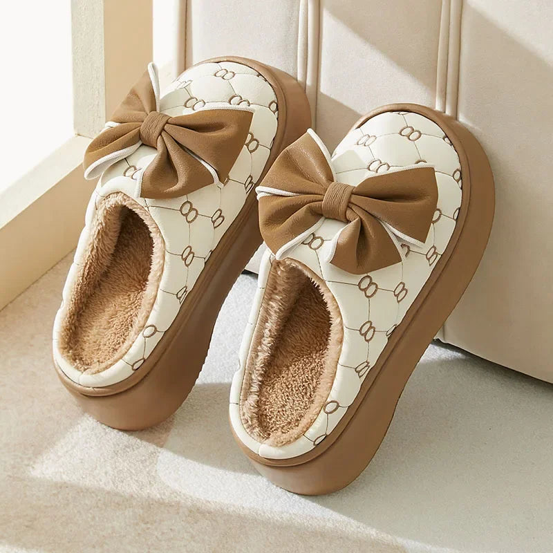 Elegant slippers with decoration and bow