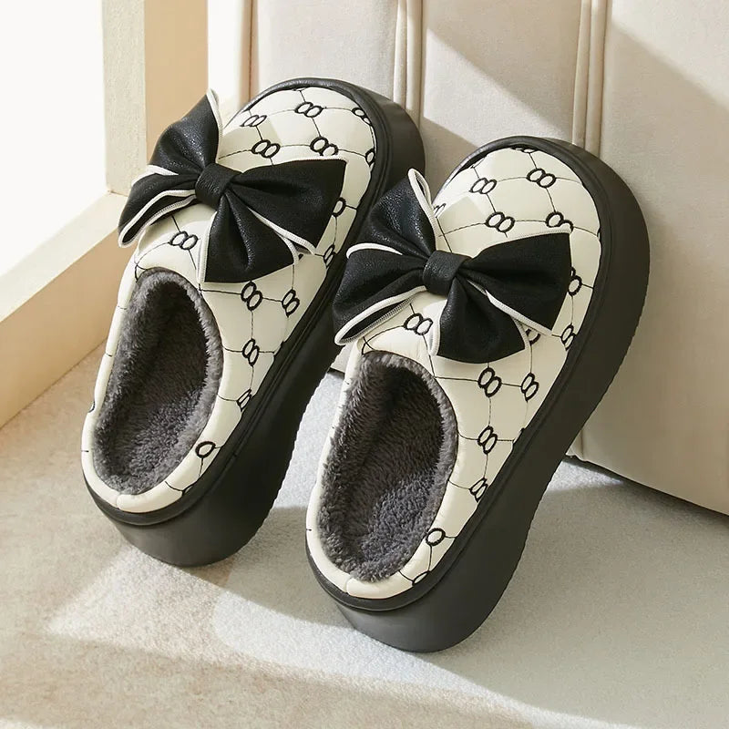 Elegant slippers with decoration and bow