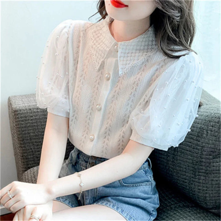 Lace blouse with puff sleeves