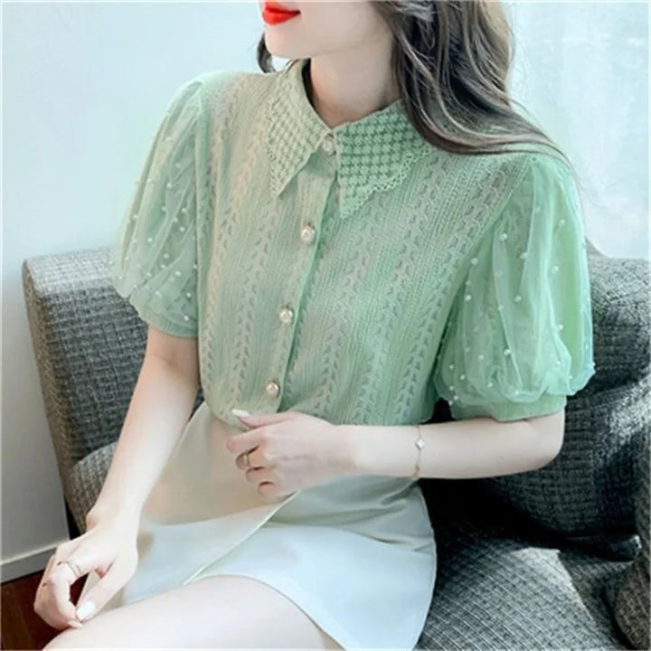 Lace blouse with puff sleeves