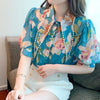 Blouse with floral bead print