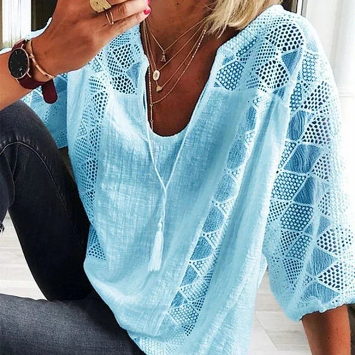 Fashionable lace blouse with V-neckline