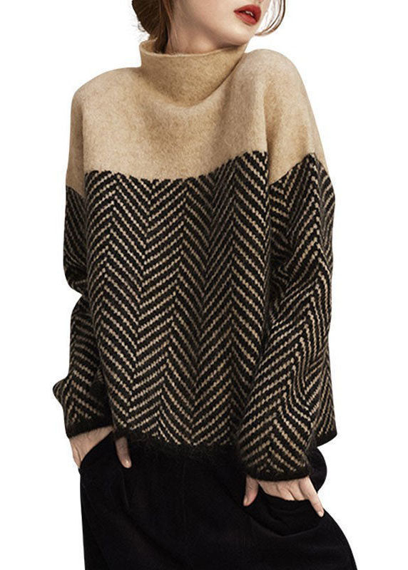 Fashionable khaki-coloured turtleneck with knitted patchwork jumper