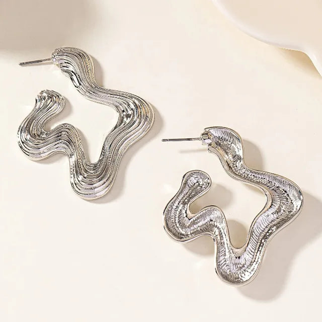 Sculptural wave statement earrings