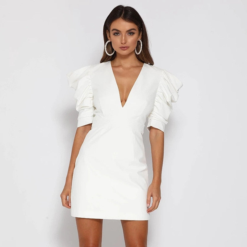 Dress with puff sleeves and V-neck in white