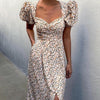 Women's floral dress with puff sleeves and back neckline