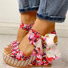 Wedge sandals with floral pattern