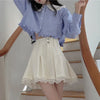 Dainty pleated skirt in Lolita style with lace trim