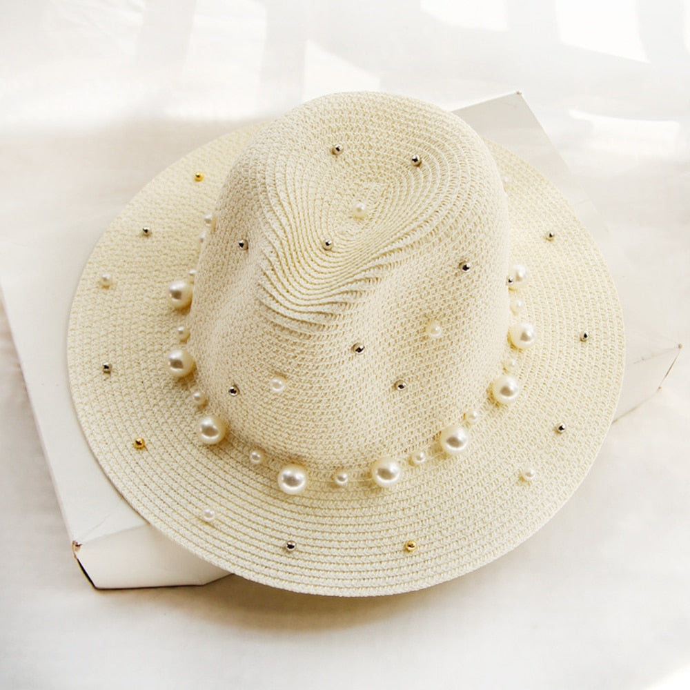 Elegant sun hat with pearl embellishments