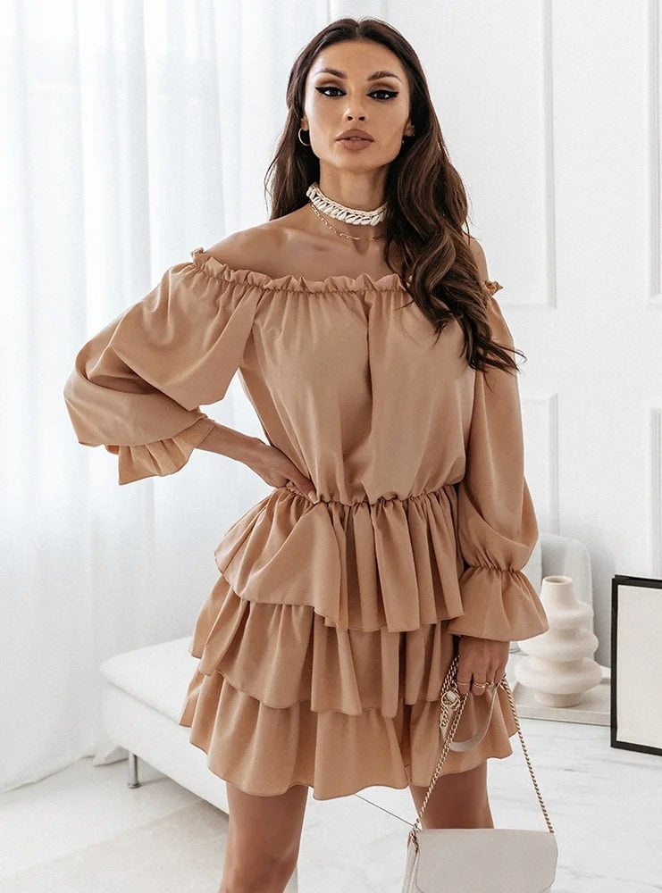 Long off-the-shoulder dress with puff sleeves