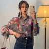 Long-sleeved chiffon blouse with floral V-neckline