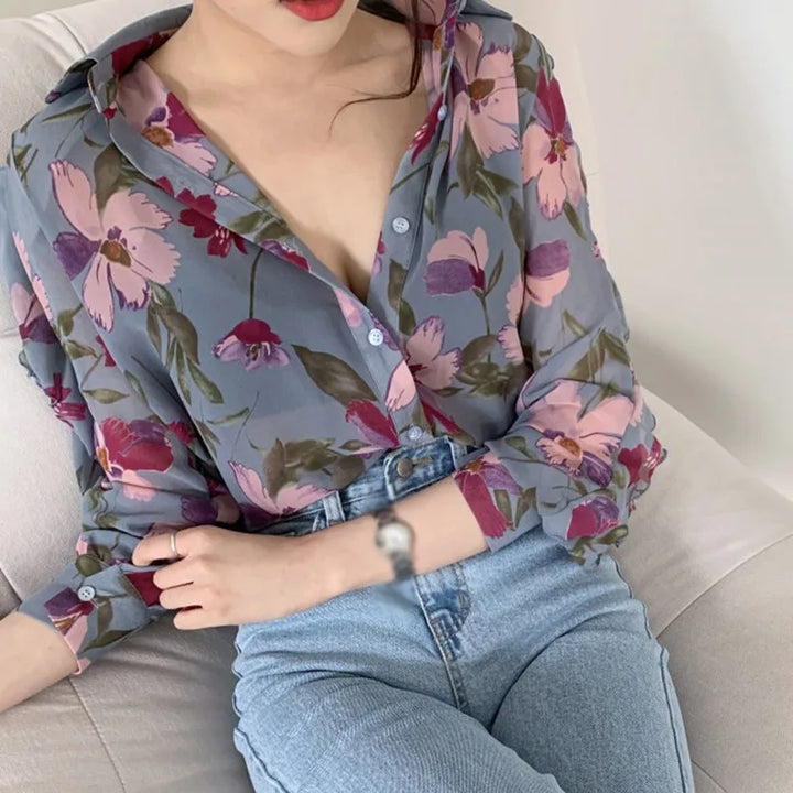 Long-sleeved chiffon blouse with floral V-neckline